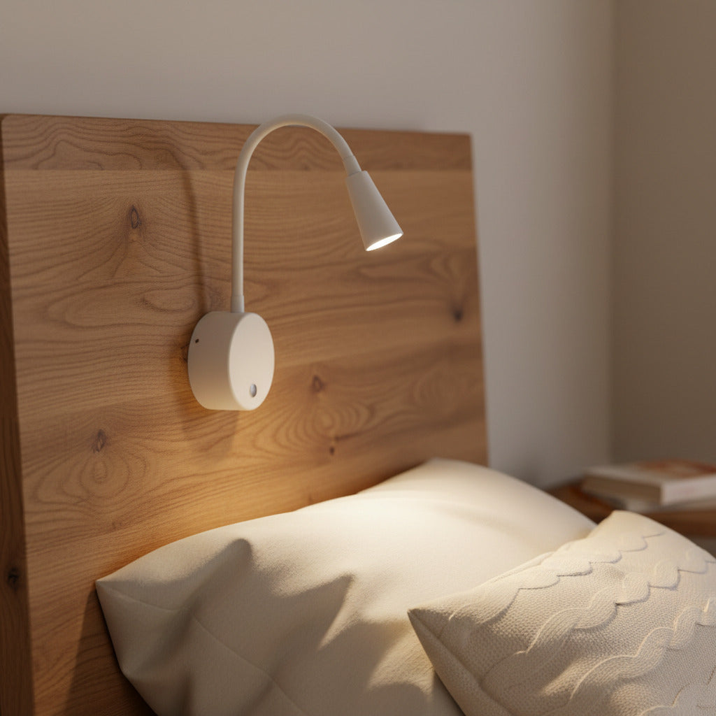 white dimmable bedroom reading lamp mounted on a wooden headboard