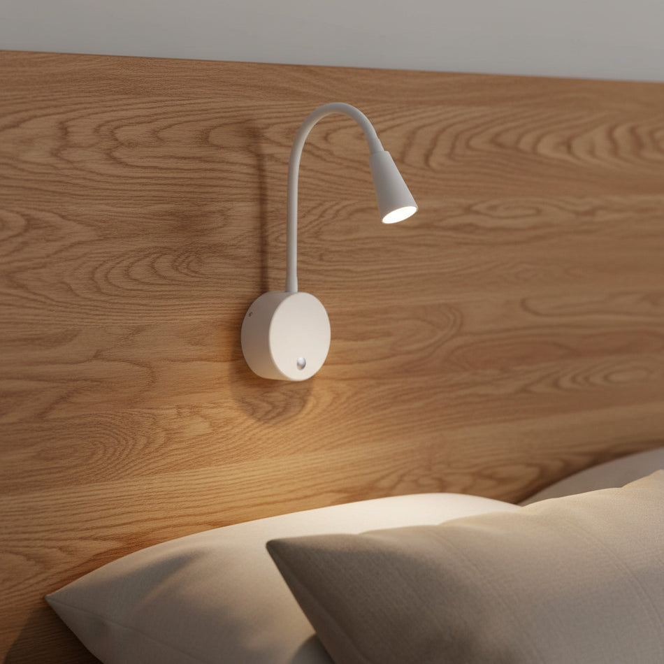 white dimmable bedroom reading lamp fitted to a wooden bed headboard
