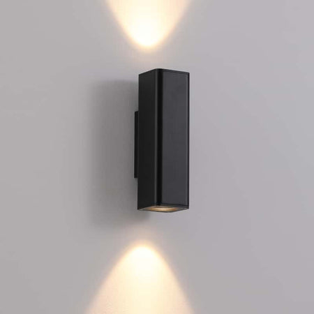 black up and down exterior light shown on a white wall 