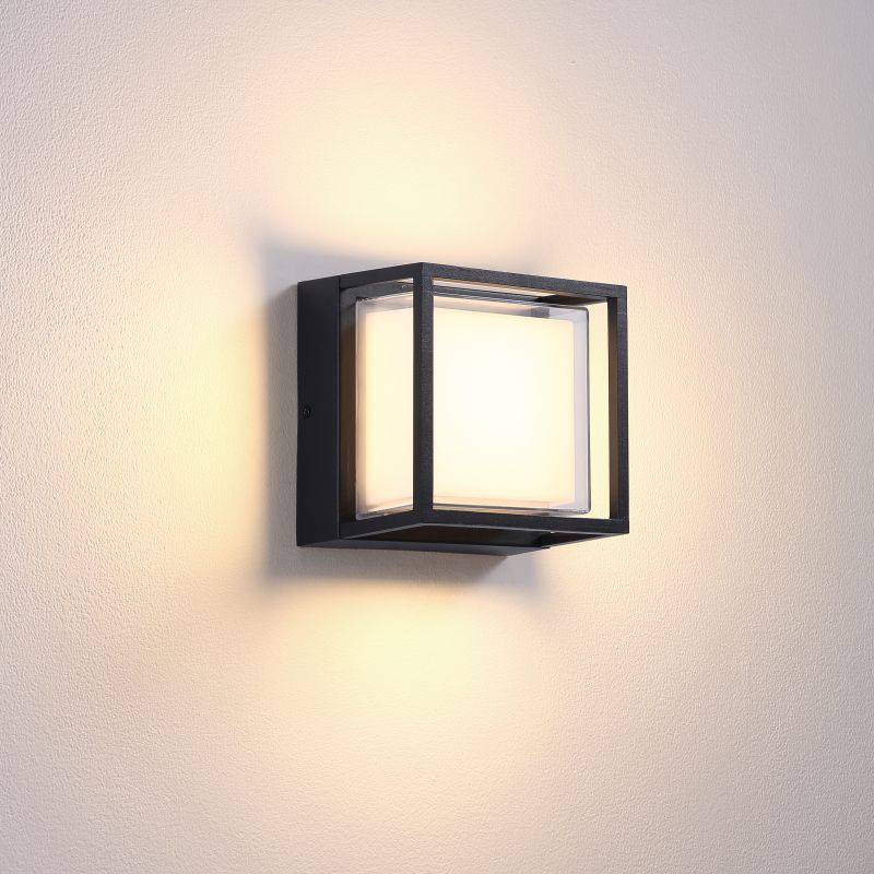 black square outside wall light mounted on a white wall 
