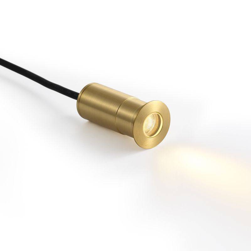 brass in ground deck light on a white background