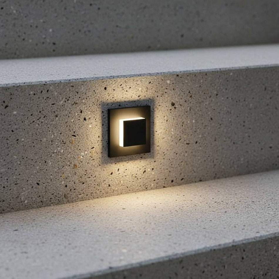 black flush outdoor wall light mounted in outside concrete steps 