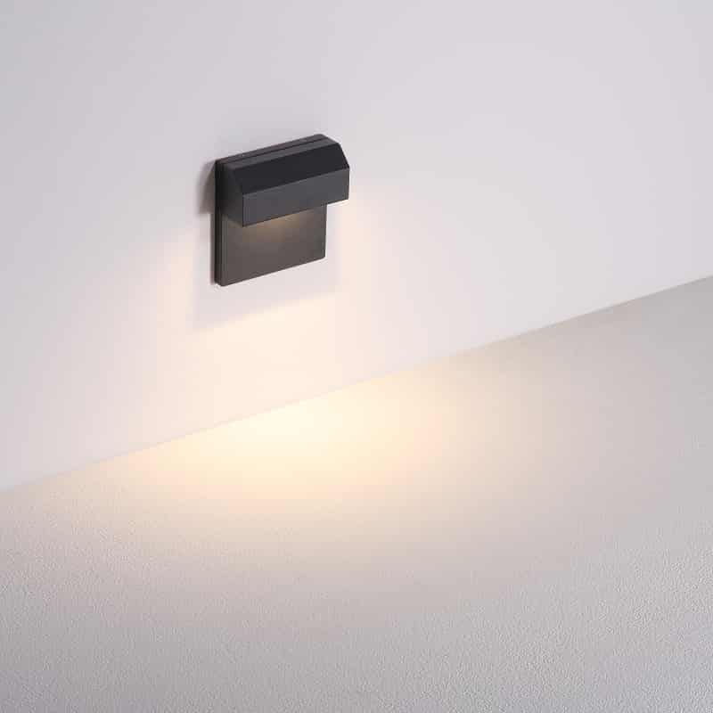 black light for outdoor stairs mounted on a white wall 