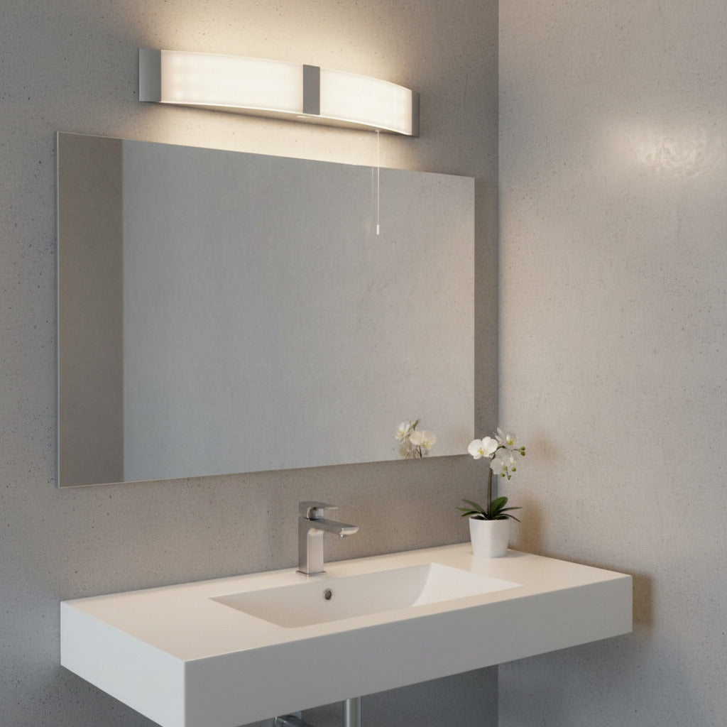 bathroom shaver light mounted above a mirror in a modern bathroom