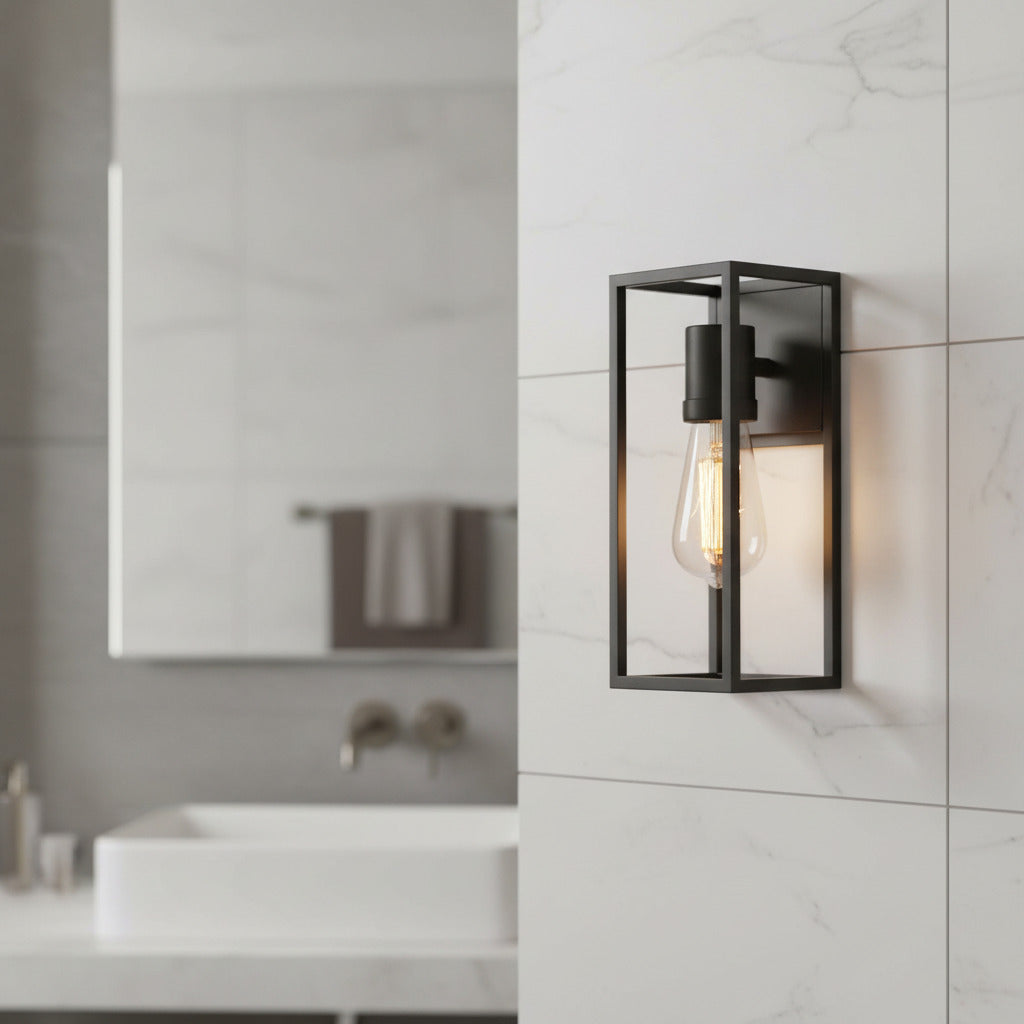 matte black bathroom wall sconce mounted in the wall in a modern bathroom