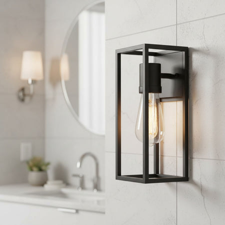 matte black bathroom wall sconce mounted on a tiled bathroom wall 
