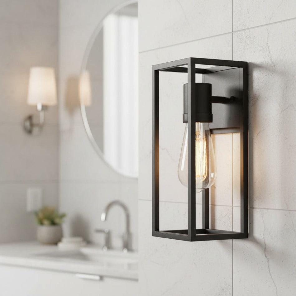 matte black bathroom wall sconce mounted on a tiled bathroom wall 