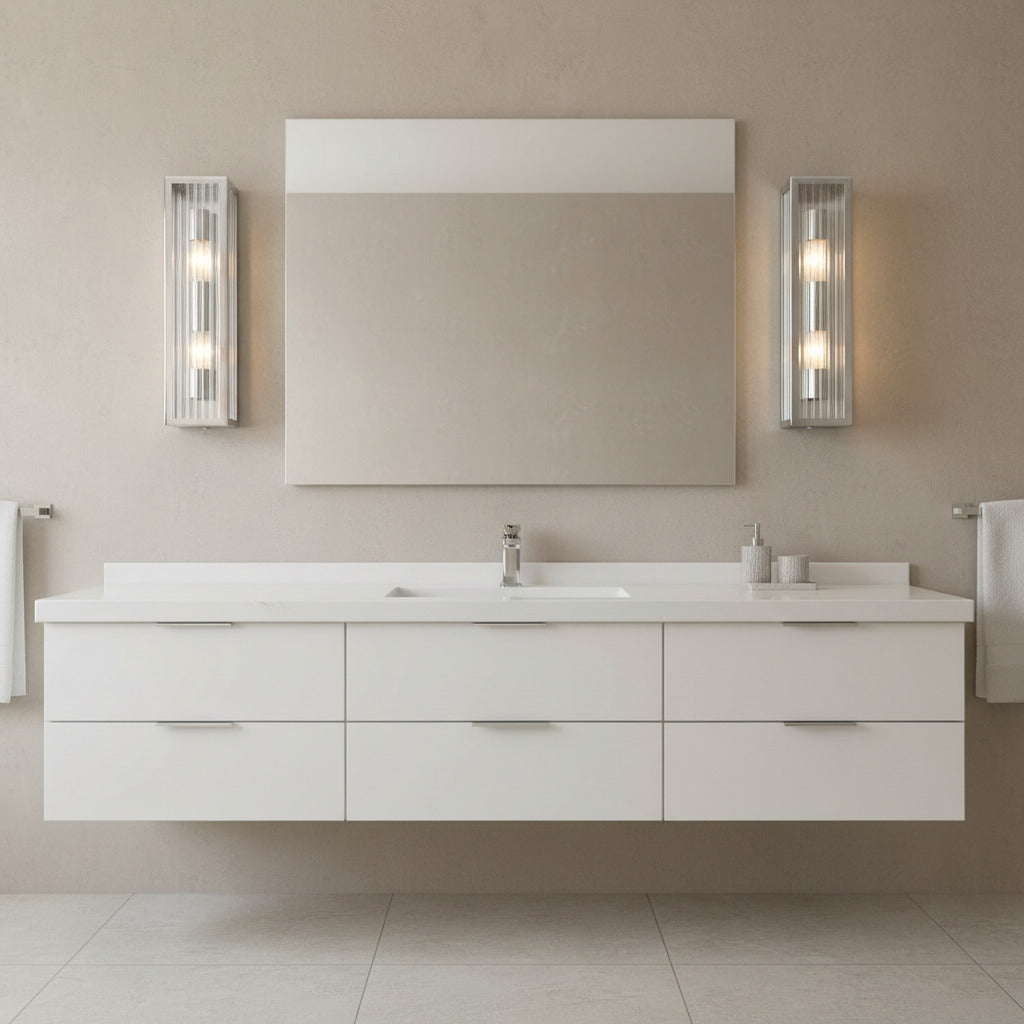 chrome bathroom vanity wall light mounted either side of a bathroom mirror 