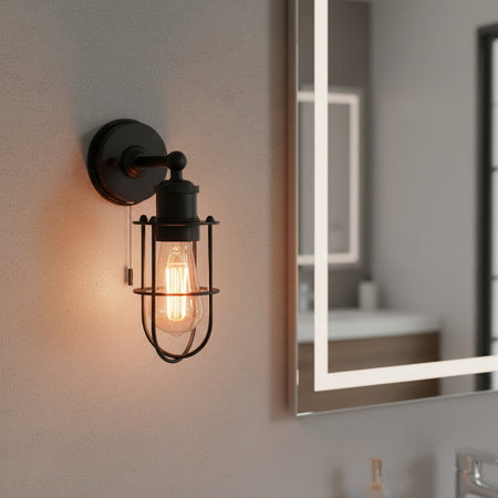 matt black bathroom wall light mounted on the wall next to a bathroom mirror 