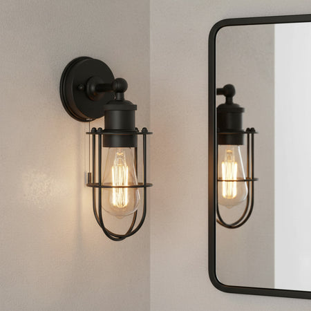 matt black bathroom wall light mounted next to a bathroom mirror 