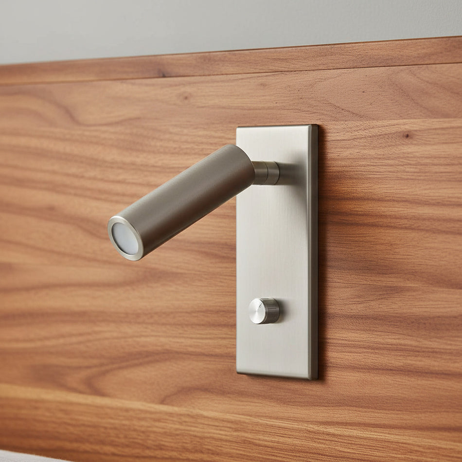 silver recessed dimmable reading lamp mounted in a wooden headboard