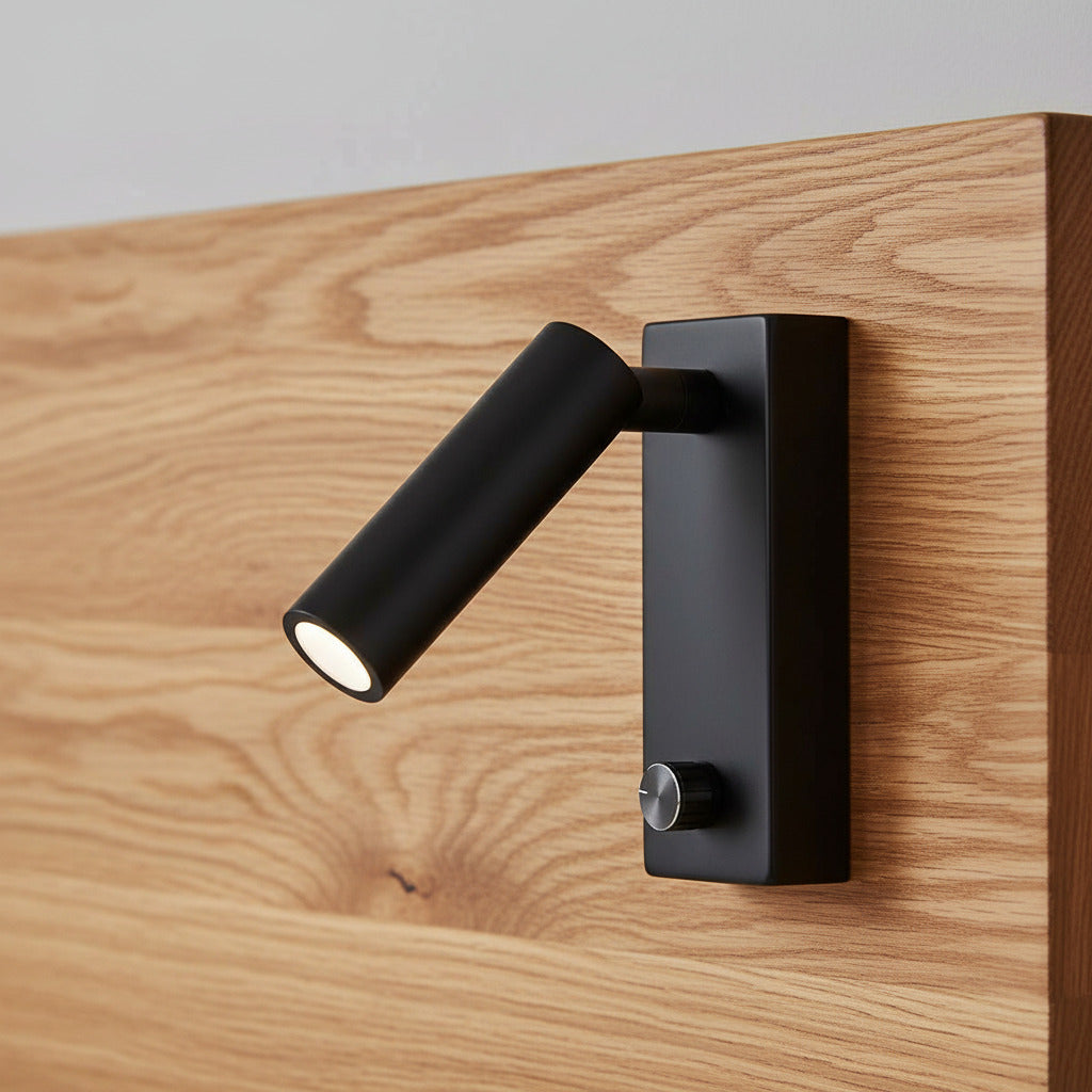 black dimmable bedside reading lamp mounted on a wooden headboard