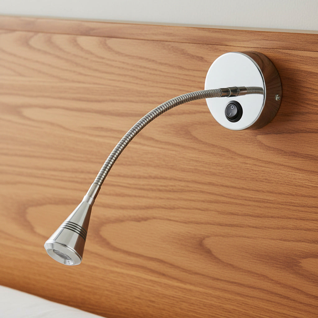 polished chrome flexible reading lamp fitted to a wooden bed headboard