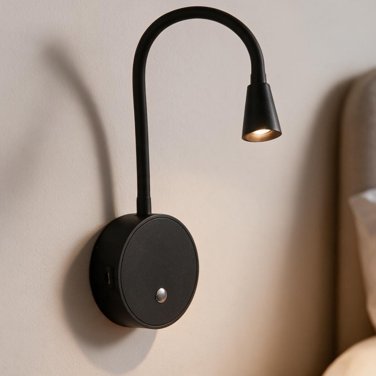 Ultra Beam Lighting Ltd black flexible LED wall reading light with integrated USB charging ports and touch switch