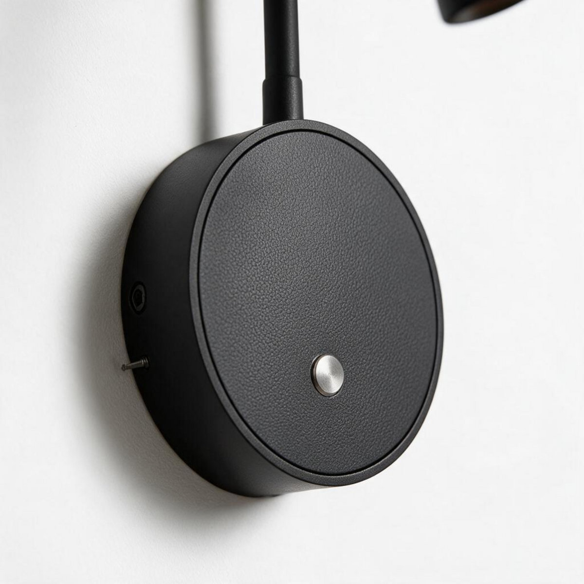 Ultra Beam Lighting Ltd black flexible LED reading light with a touch switch and USB port mounted on a white wall