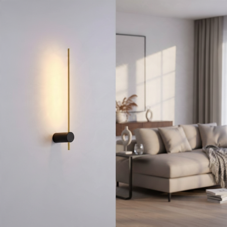 Ultra Beam Lighting Ltd 6W LED wall sconce in black and gold with a cylindrical base and backlit warm white glow.