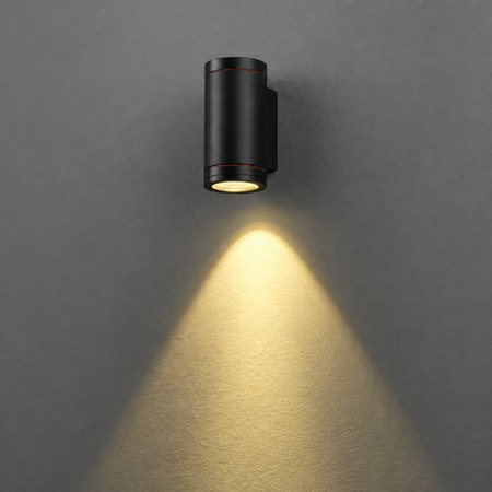 Ultra Beam Lighting Ltd 6W black aluminium LED outdoor wall downlight casting a warm light beam on a grey wall