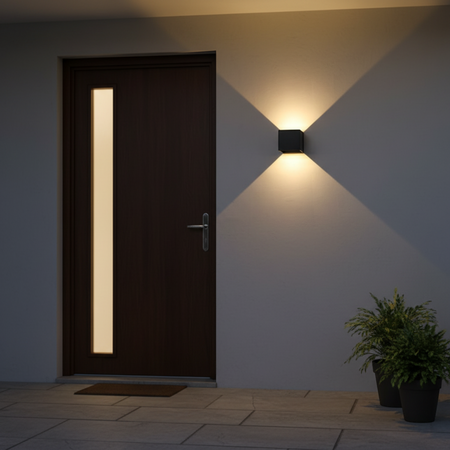 Ultra Beam Lighting Ltd black square LED up and down outdoor wall light mounted next to a modern front door