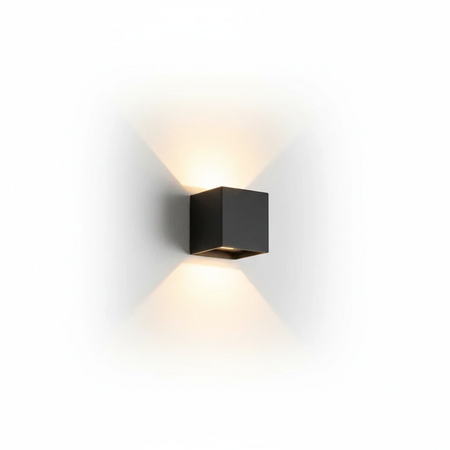 Ultra Beam Lighting Ltd black square LED outdoor wall light with up and down beam effect on a white wall