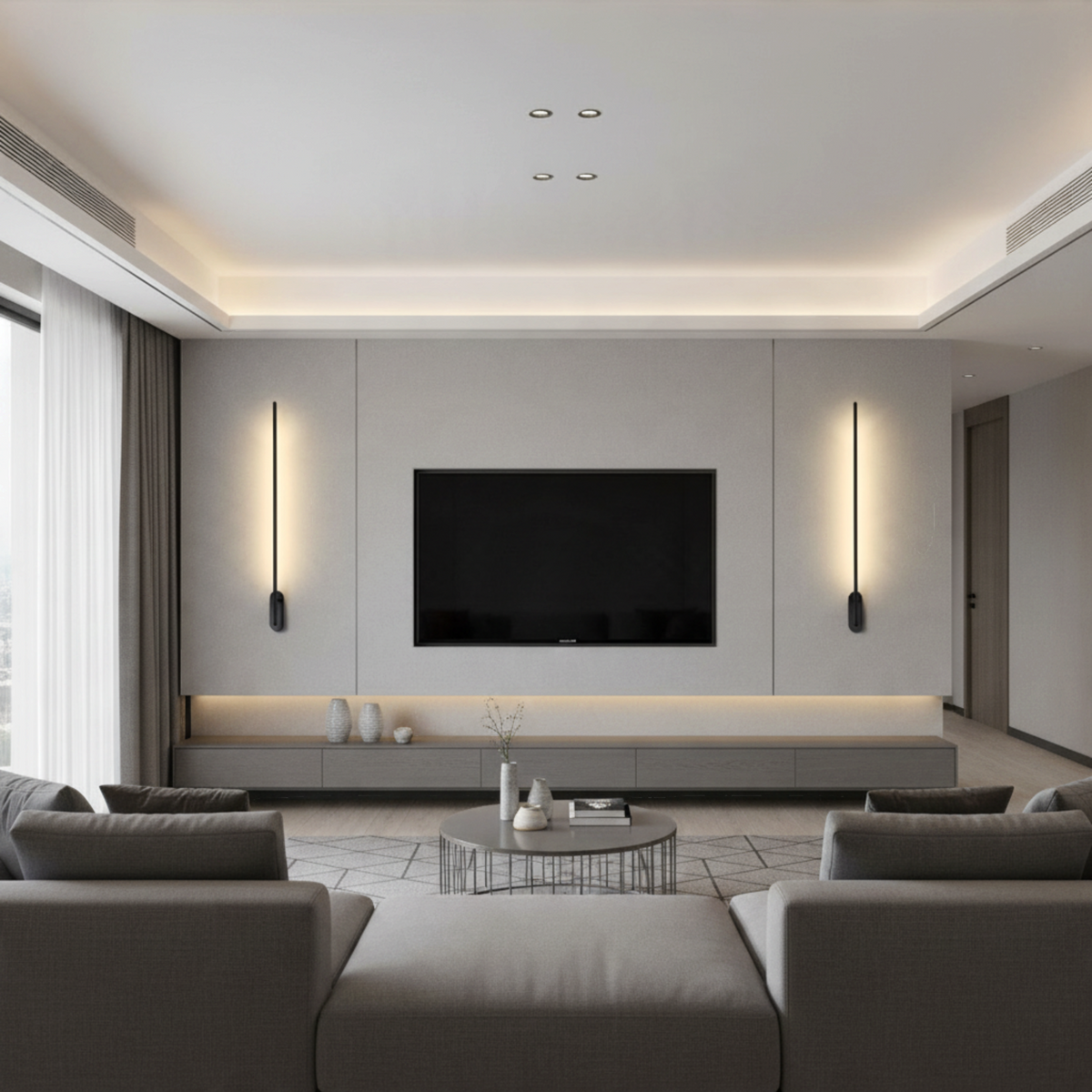 Ultra Beam Lighting Ltd 10W LED black wall lights mounted vertically in a modern living room with halo wash effect