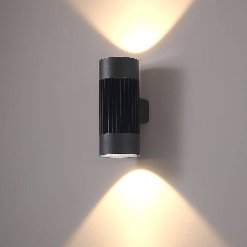 Ultra Beam Lighting Ltd 40W black LED exterior wall light with dual vertical warm white beams on a facade