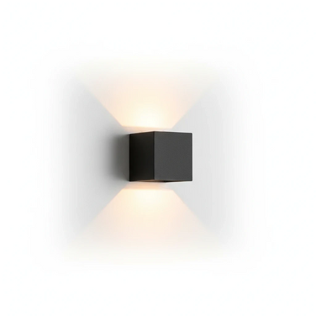 Ultra Beam Lighting Ltd black square LED outdoor wall light with dual up and down beams on a white wall