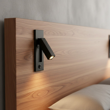 Ultra Beam Lighting Ltd black adjustable recessed reading light mounted on a wooden headboard with a rocker switch.