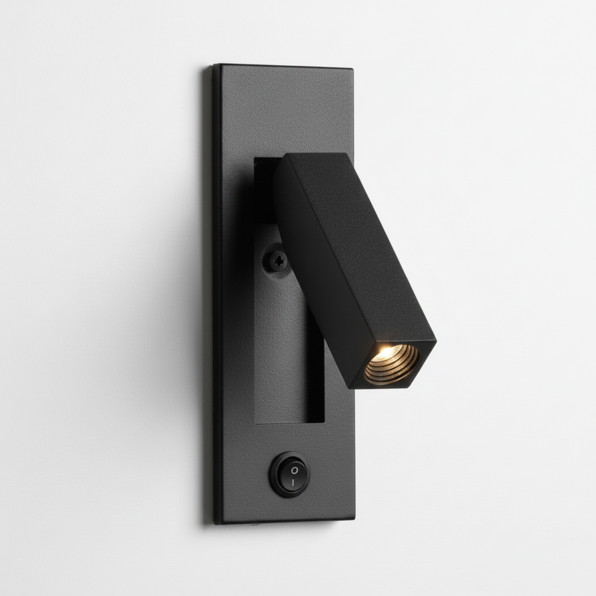 Ultra Beam Lighting Ltd black recessed reading light with adjustable arm and rocker switch on a white wall