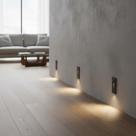 Ultra Beam Lighting Ltd black recessed motion sensor step lights installed along a modern indoor wall