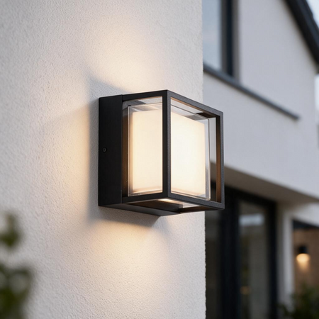 Ultra Beam Lighting Ltd 12W square black outdoor wall light with frosted acrylic lens on a white exterior wall