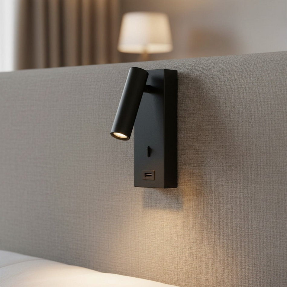 Ultra Beam Lighting Ltd black wall-mounted LED reading light with adjustable head and integrated USB charging port.