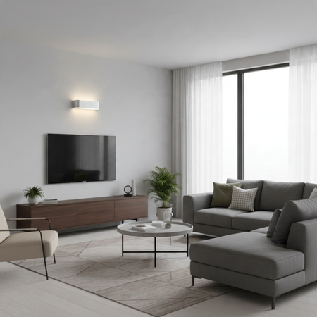 Ultra Beam Lighting Ltd brushed aluminium up and down wall light mounted above a TV in a modern living room.