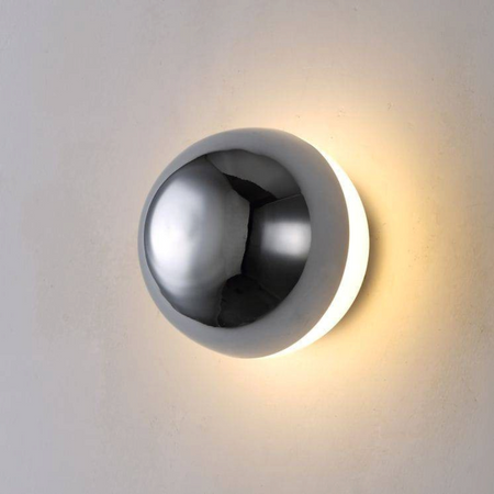 Ultra Beam Lighting Ltd 6W chrome dome wall light with an acrylic diffuser creating a warm halo effect on a wall.