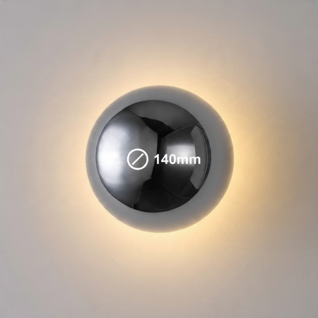 Ultra Beam Lighting Ltd 6W dome wall light in polished chrome with a glowing halo effect on a white wall
