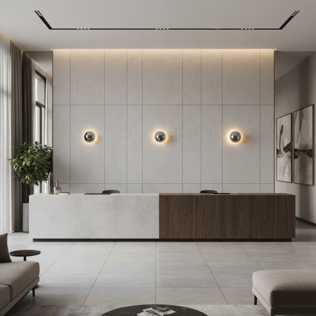 Ultra Beam Lighting Ltd 6W chrome dome wall lights with halo effect installed on a modern office feature wall.