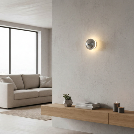Ultra Beam Lighting Ltd 6W chrome dome wall light with halo effect mounted on a textured wall in a modern living room.
