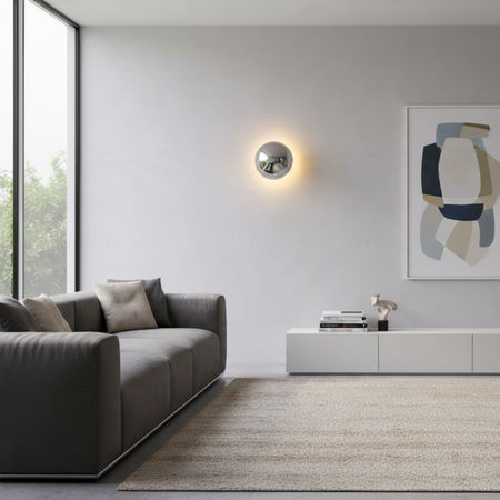 Ultra Beam Lighting Ltd 6W chrome dome wall light with halo effect mounted in a modern minimalist living room.