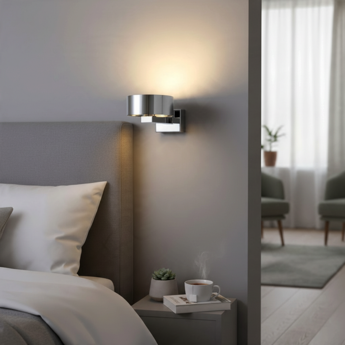Ultra Beam Lighting Ltd chrome LED bedside wall reading light mounted above a grey bedroom headboard