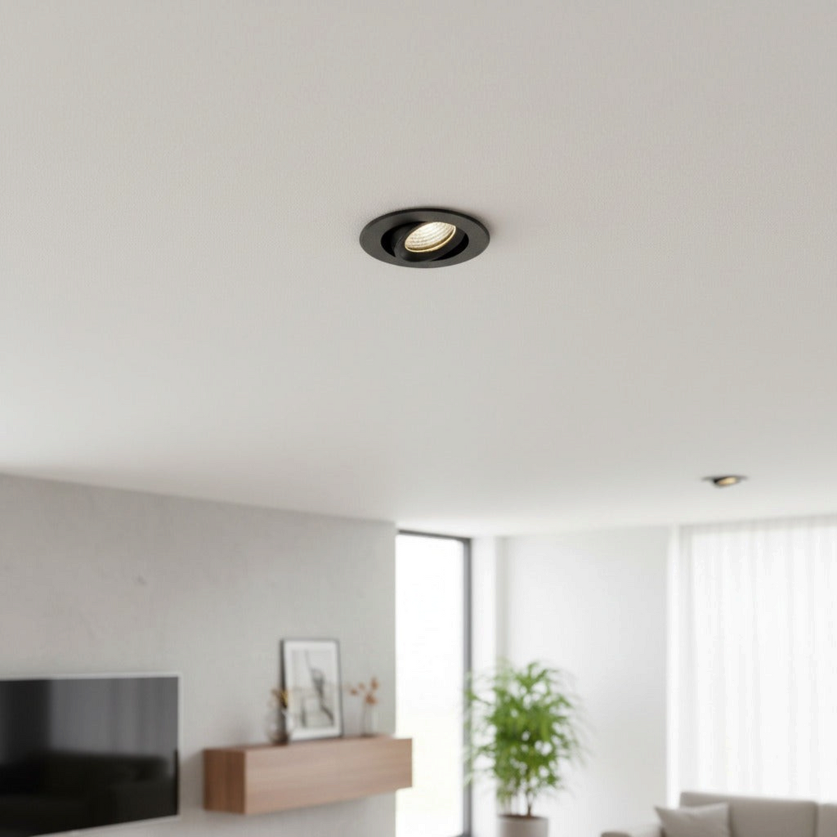 Ultra Beam Lighting Ltd Onyx 6W black recessed LED downlight installed in a modern white ceiling