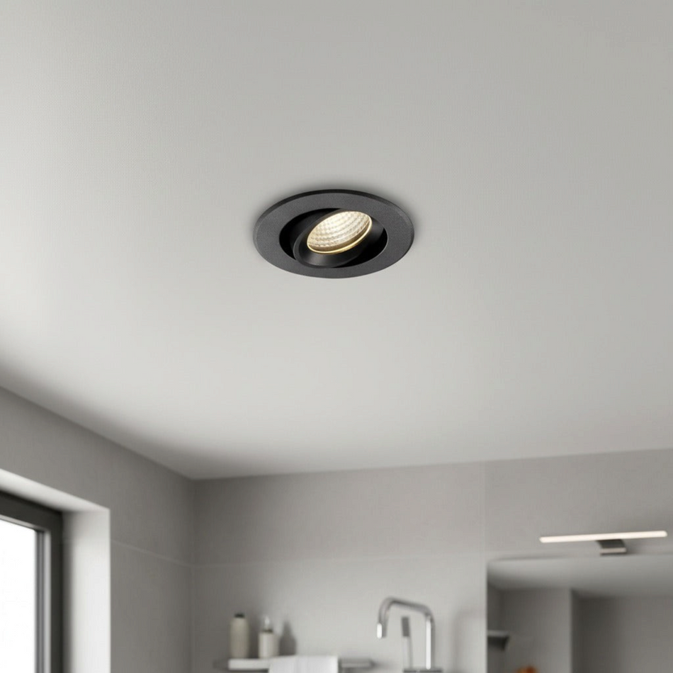 Ultra Beam Lighting Ltd Onyx 6W black recessed LED downlight with gimbal tilting adjustment installed in a ceiling