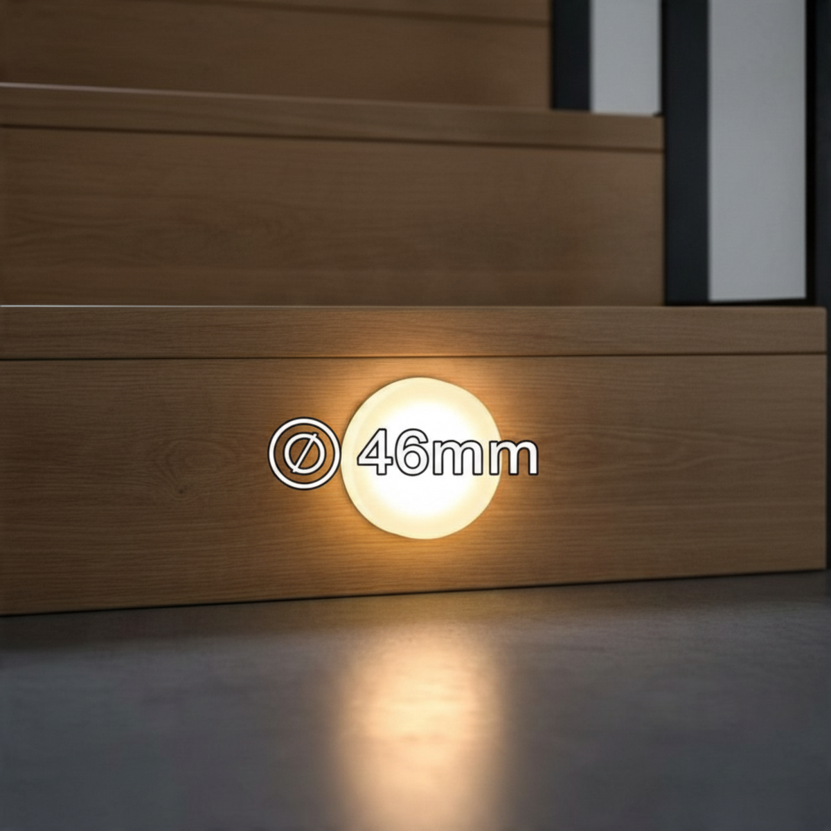 Ultra Beam Lighting Ltd round 1-watt recessed LED stair light with sand-blasted acrylic diffuser in a wooden riser