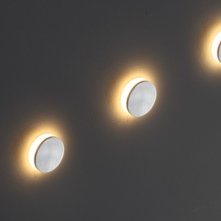 Ultra Beam Lighting Ltd round 1 watt recessed LED staircase light with polished aluminium faceplate and halo glow