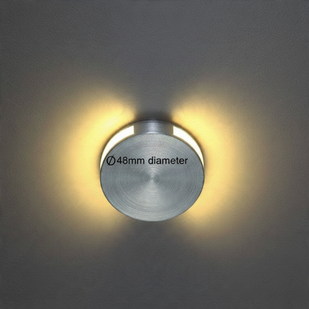 Ultra Beam Lighting Ltd Halo round 1W recessed LED step light in brushed aluminum with a soft warm glow