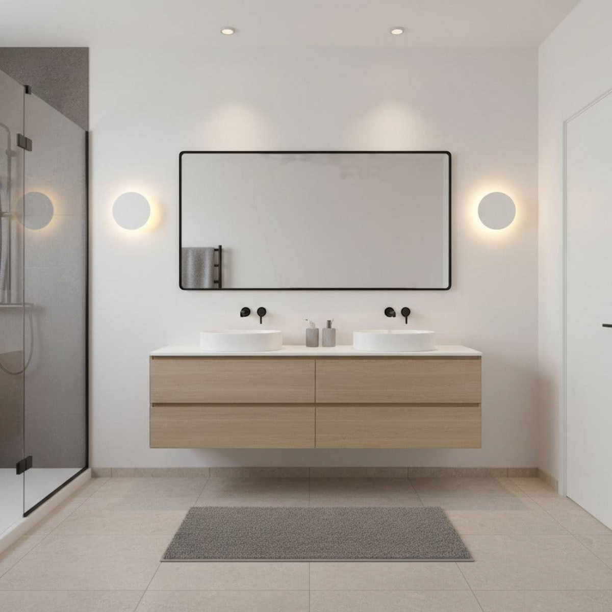 white modern bathroom wall sconce mounted either side of a mirror in a modern bathroom