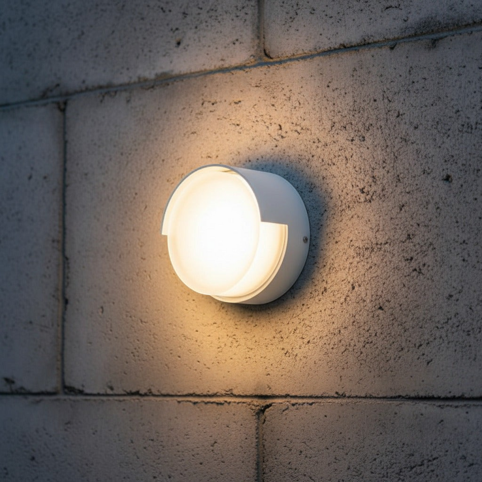 Ultra Beam Lighting Ltd round white modern LED exterior wall light with eyelid design and opal acrylic diffuser