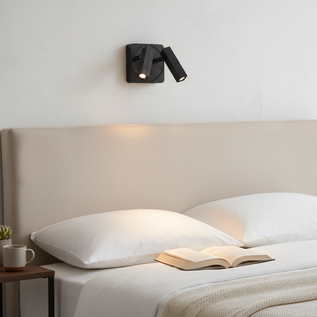 Ultra Beam Lighting Ltd Seville twin black LED reading lamp mounted above a bed with adjustable light heads