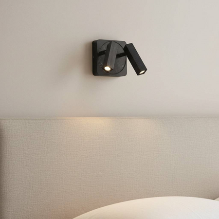 Ultra Beam Lighting Ltd Seville twin 3 watt black LED reading lamp mounted above a neutral fabric headboard.