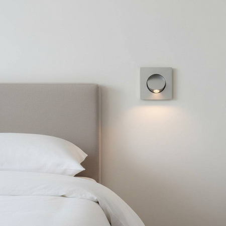 Ultra Beam Lighting Ltd square silver recessed LED reading lamp installed in a modern bedroom headboard