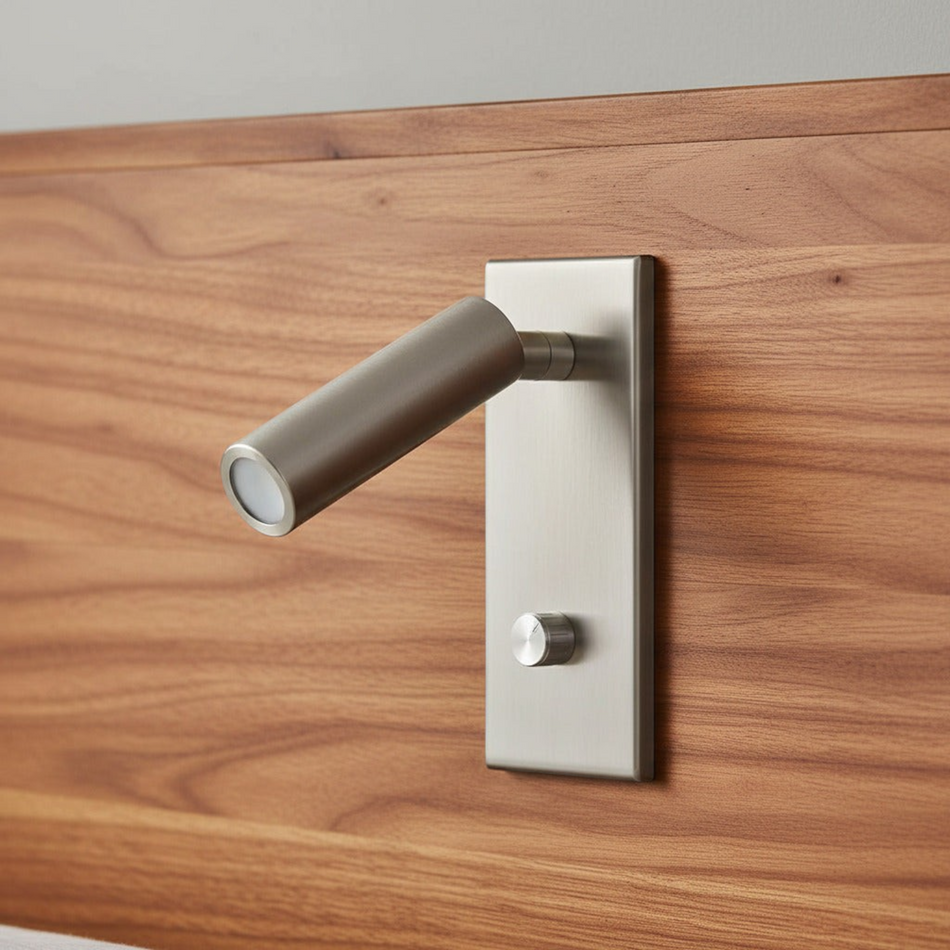 silver recessed dimmable reading lamp mounted in a wooden headboard
