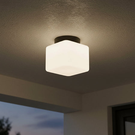 Ultra Beam Lighting Ltd 12W square LED outdoor ceiling light with a frosted glass shade mounted on a porch ceiling.